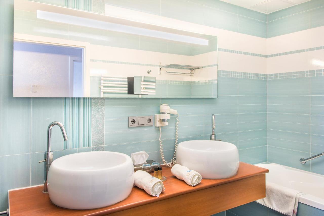 Echo Residence All Suite Hotel Тихань Экстерьер фото